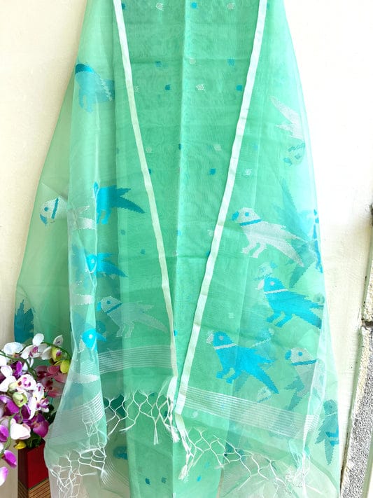 Chidiya muslin woven suit with zari and silk weaving, featuring polka dot motifs on the top by Rihyaaz Fashions.