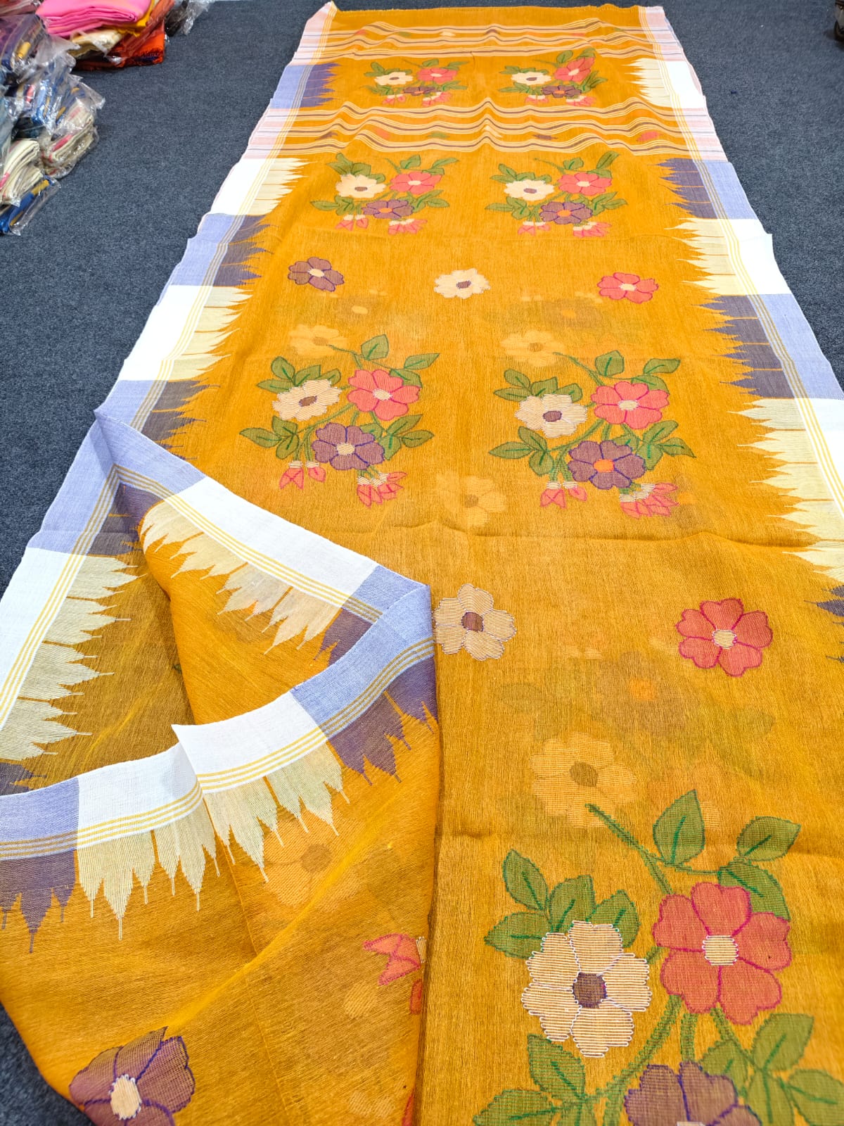 Exclusive handloom Manipuri saree with intricate all-over work, 13–14 haat long length and running blouse piece by Rihyaaz.