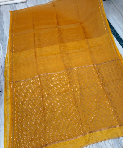 Shama Pure Resham festive saree with dual silver and golden zari stripes, sequin work on palla and border, paired with Pure Matka blouse piece by Rihyaaz.