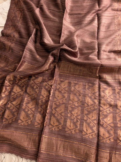 Durga Mustard brown premium-quality Pure Matka Jamdani saree with traditional woven designs and running Matka blouse piece by Rihyaaz Fashions.