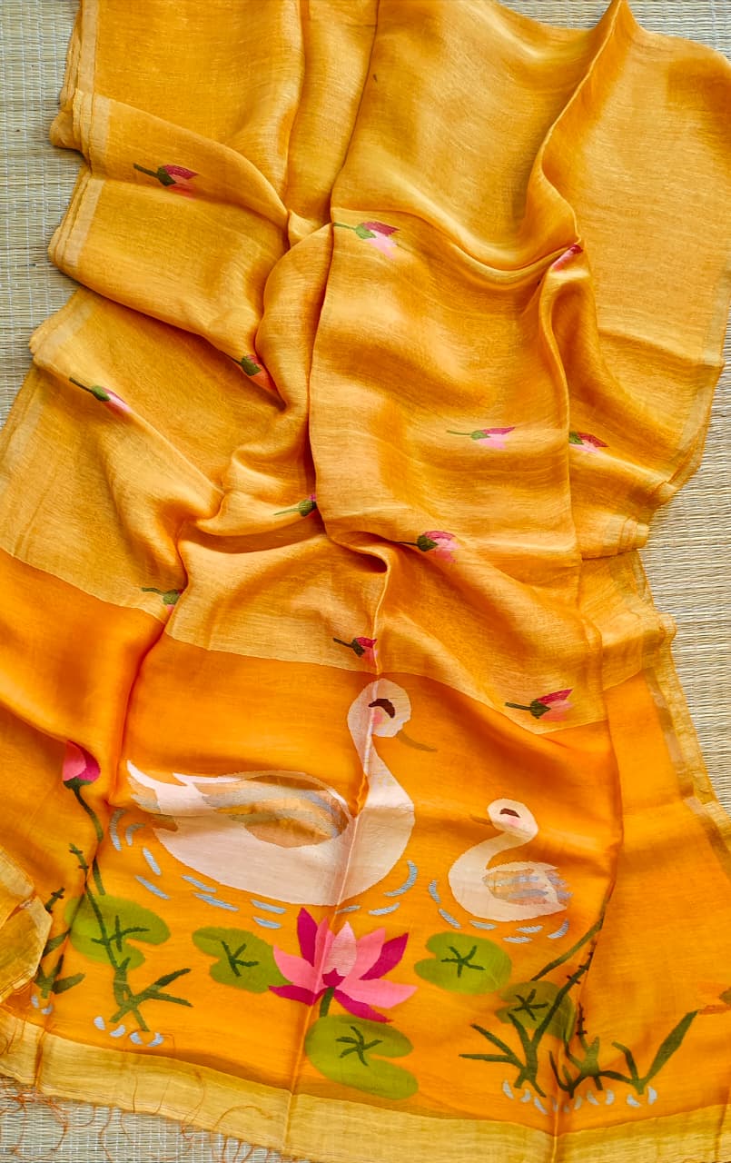 Morali mustard Yellow pure silk Jayshree linen saree with sleek zari border, handwoven Jamdani resham palla and delicate lotus motifs all over the body, with running blouse piece by Rihyaaz Fashions.