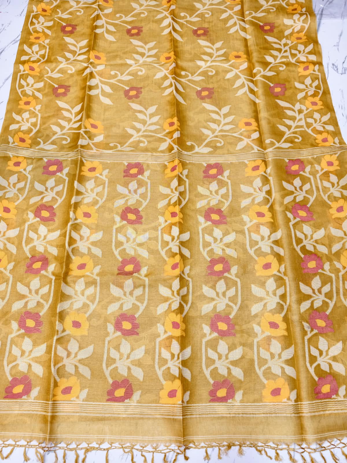 Bageecha Mustard yellow Pure Tussar Jamdani saree with intricate all-over handwoven floral Jamdani work, Silk Mark certified by Rihyaaz 