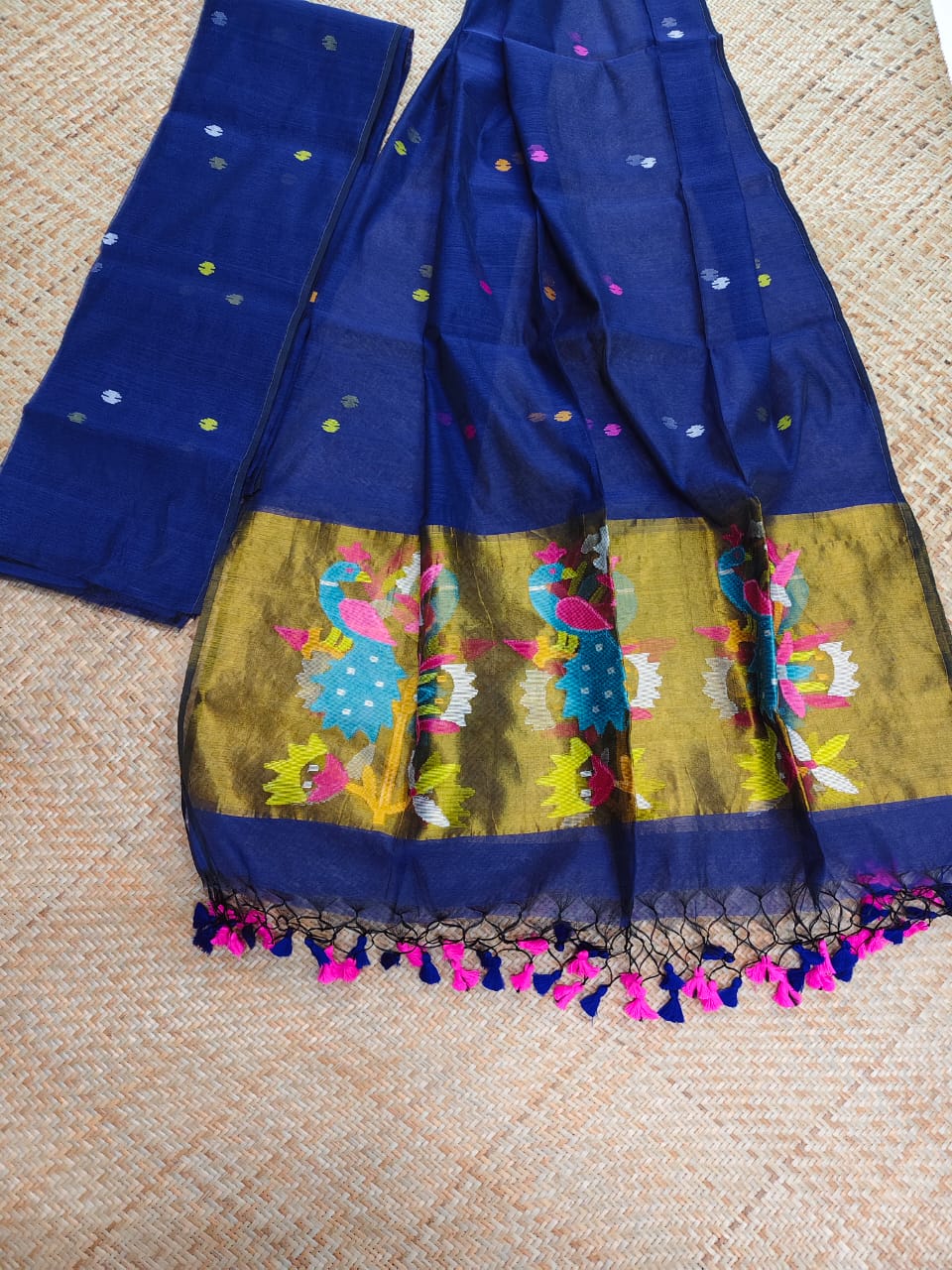 Morni navy premium muslin tissue suit with intricate needle work Jamdani palla Peacock Motif dupatta by Rihyaaz.