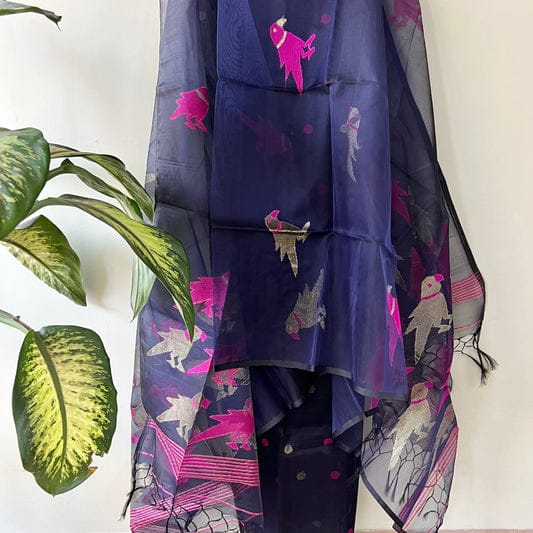 Chidiya muslin woven suit with zari and silk weaving, featuring polka dot motifs on the top by Rihyaaz Fashions.