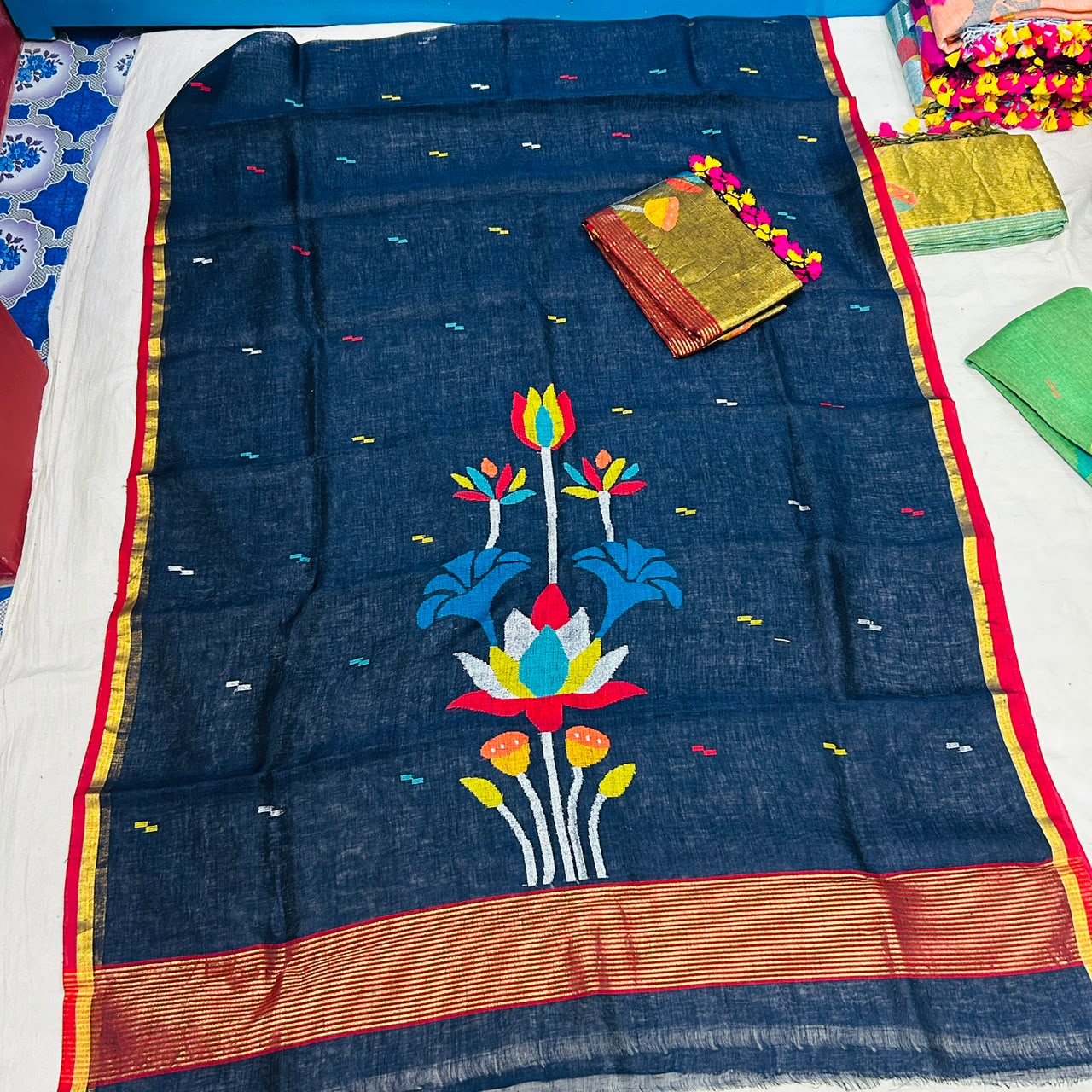 Linen Jamdani suit set by Rihyaaz featuring 2.5 metre top fabric and dupatta, showcasing elegant traditional Jamdani weaving and handcrafted ethnic design.