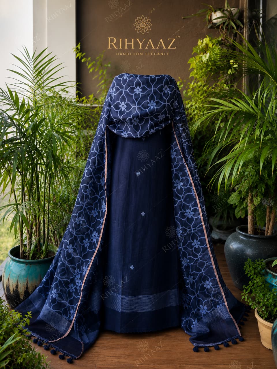 Zohra pure linen polka weaved suit with an all-over woven floral dupatta by  Rihyaaz for a graceful elegant look.