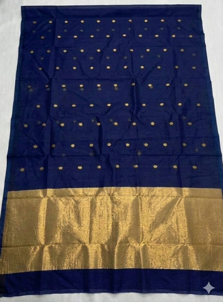 Pure muslin allover zari weaved butti works handwoven saree with zari pallu and a running blouse piece by Rihyaaz.