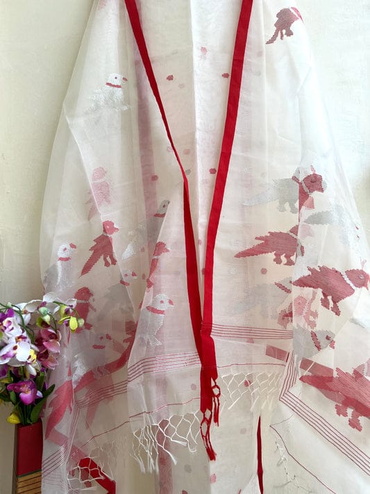 Chidiya muslin woven suit with zari and silk weaving, featuring polka dot motifs on the top by Rihyaaz Fashions.
