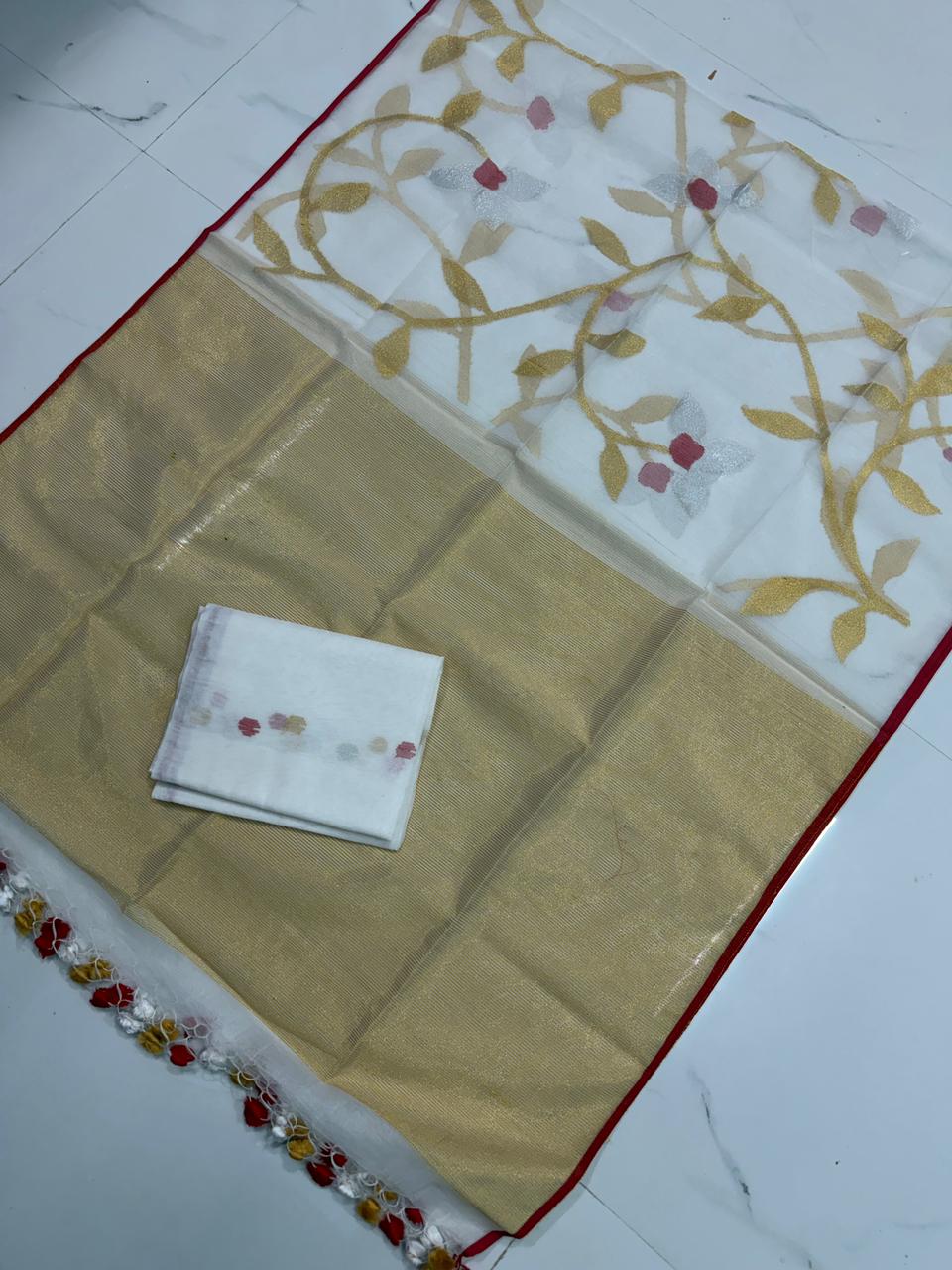 Rihyaaz Muslin Jamdani suit with handwoven detailing, 2.5 meter top and 2.5 meter tassel-finished jal work dupatta.