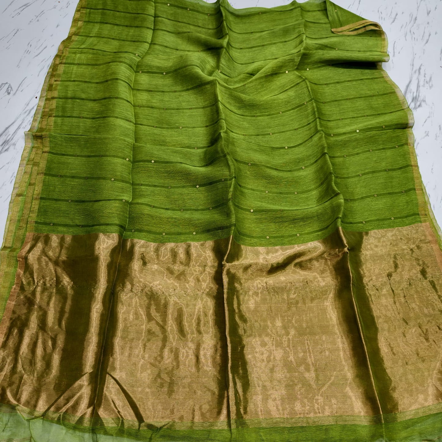 Nakshi Tissue Palla Resham Sequin Weaved Matka Saree by Rihyaaz, featuring elegant traditional weaving and luxurious tissue palla detailing.