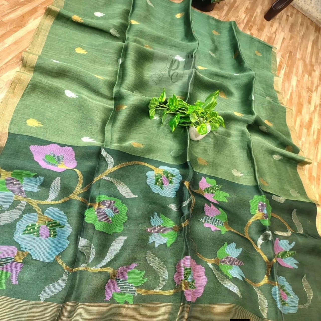 Handwoven Linen by Muslin Floral motifs saree with all-over needle weave work and golden zari border, blouse piece available | Rihyaaz