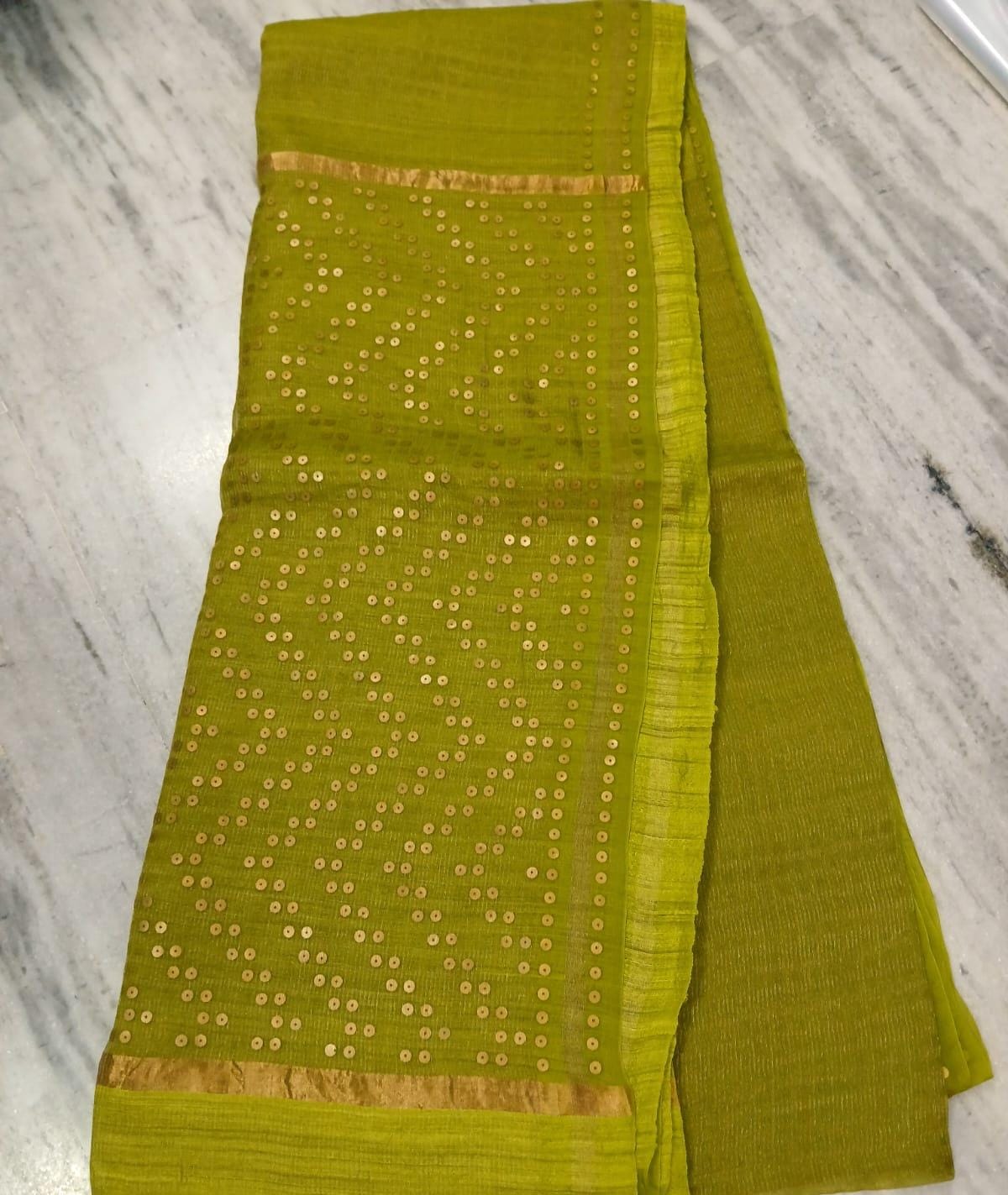 Shama Pure Resham festive saree with dual silver and golden zari stripes, sequin work on palla and border, paired with Pure Matka blouse piece by Rihyaaz.