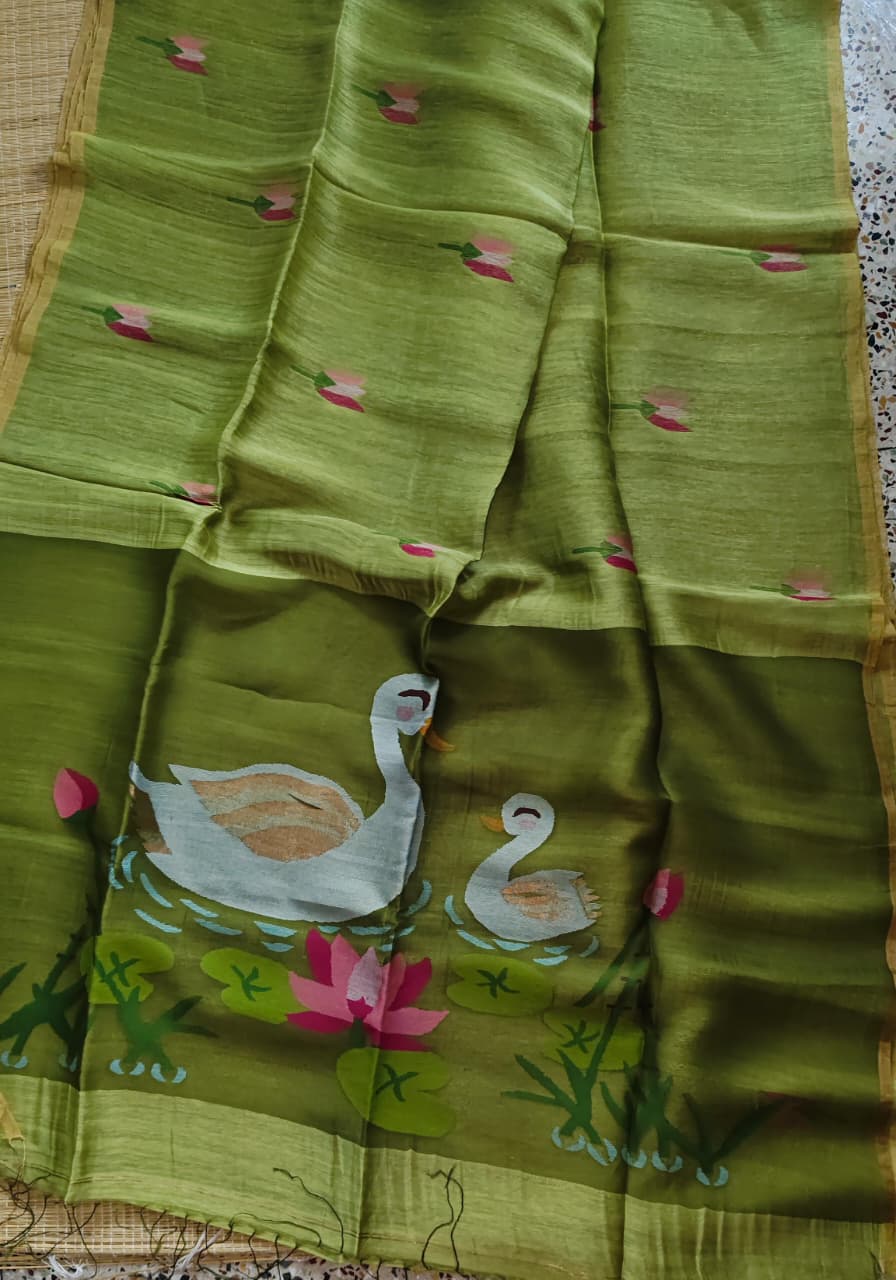 Morali olive pure silk Jayshree linen saree with sleek zari border, handwoven Jamdani resham palla and delicate lotus motifs all over the body, with running blouse piece by Rihyaaz Fashions.