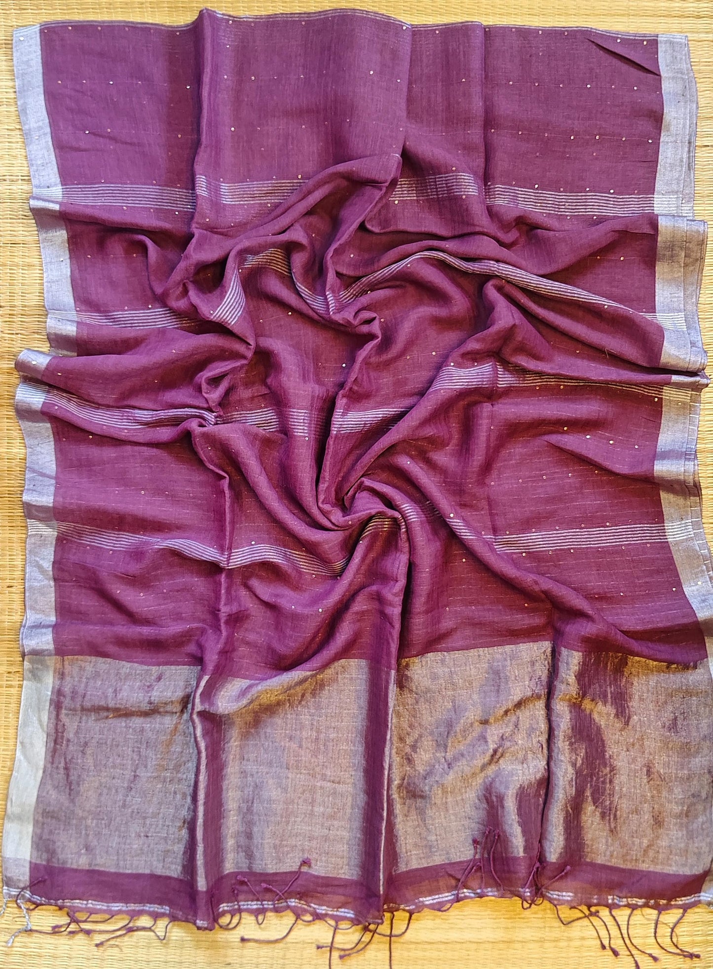 Pehal Premium Jayashree linen saree with tested zari pallu, sleek silver border, all-over sequin-line detailing and zari-striped blouse piece by Rihyaaz.