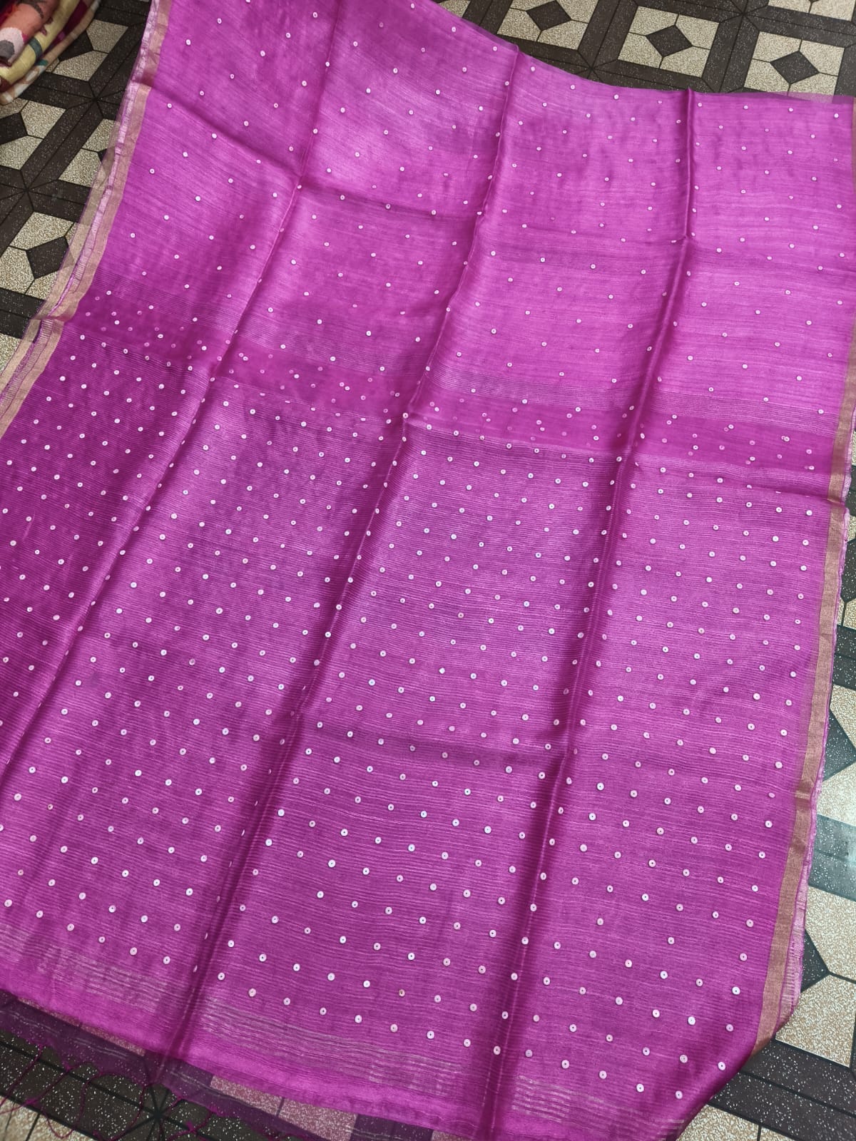 Shatranj Pure Matka Muslin Silk saree with zari border and all-over white sequin sea-shell woven palla, paired with running Matka blouse piece by Rihyaaz 