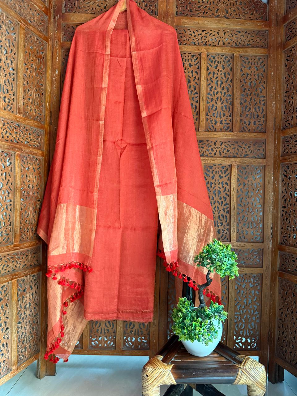 Premium broad zari palla dupatta with polka dot linen suit set in handcrafted ethnic design for festive and elegant wear.