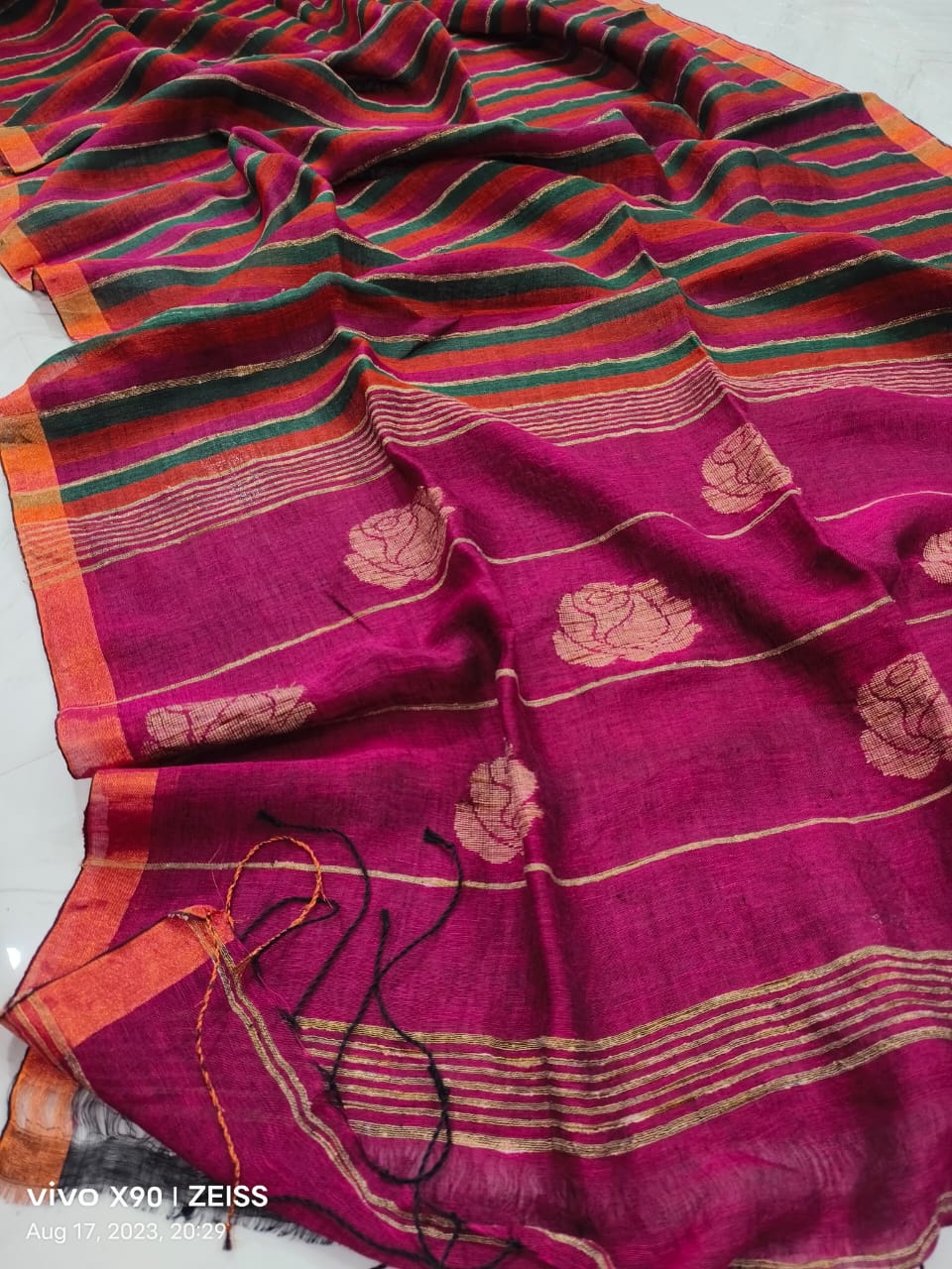 Rose handwoven striped linen saree with elegant woven stripes, rose motifs, and a lightweight traditional handloom texture by Rihyaaz 