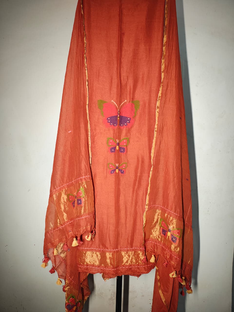 Titli trio zari handwoven Mul Cotton suit with delicate butterfly motifs and elegant zari detailing for a refined royal look by Rihyaaz 