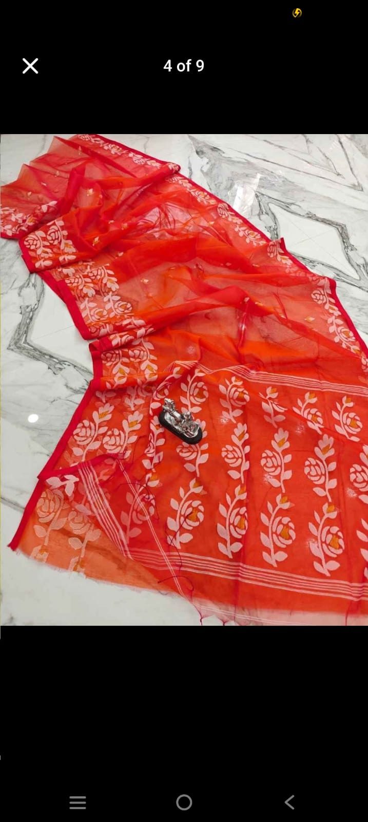Muslin jacquard weaving saree by Rihyaaz featuring intricate woven patterns and an elegant lightweight drape.
