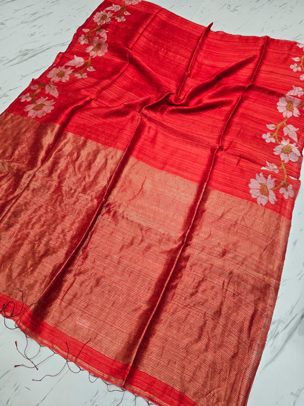 Jui Orange Pure Motka Silk Saree with blouse piece from Rihyaaz. Premium-quality silk with Silk Mark authenticity, perfect for festive and traditional occasions.