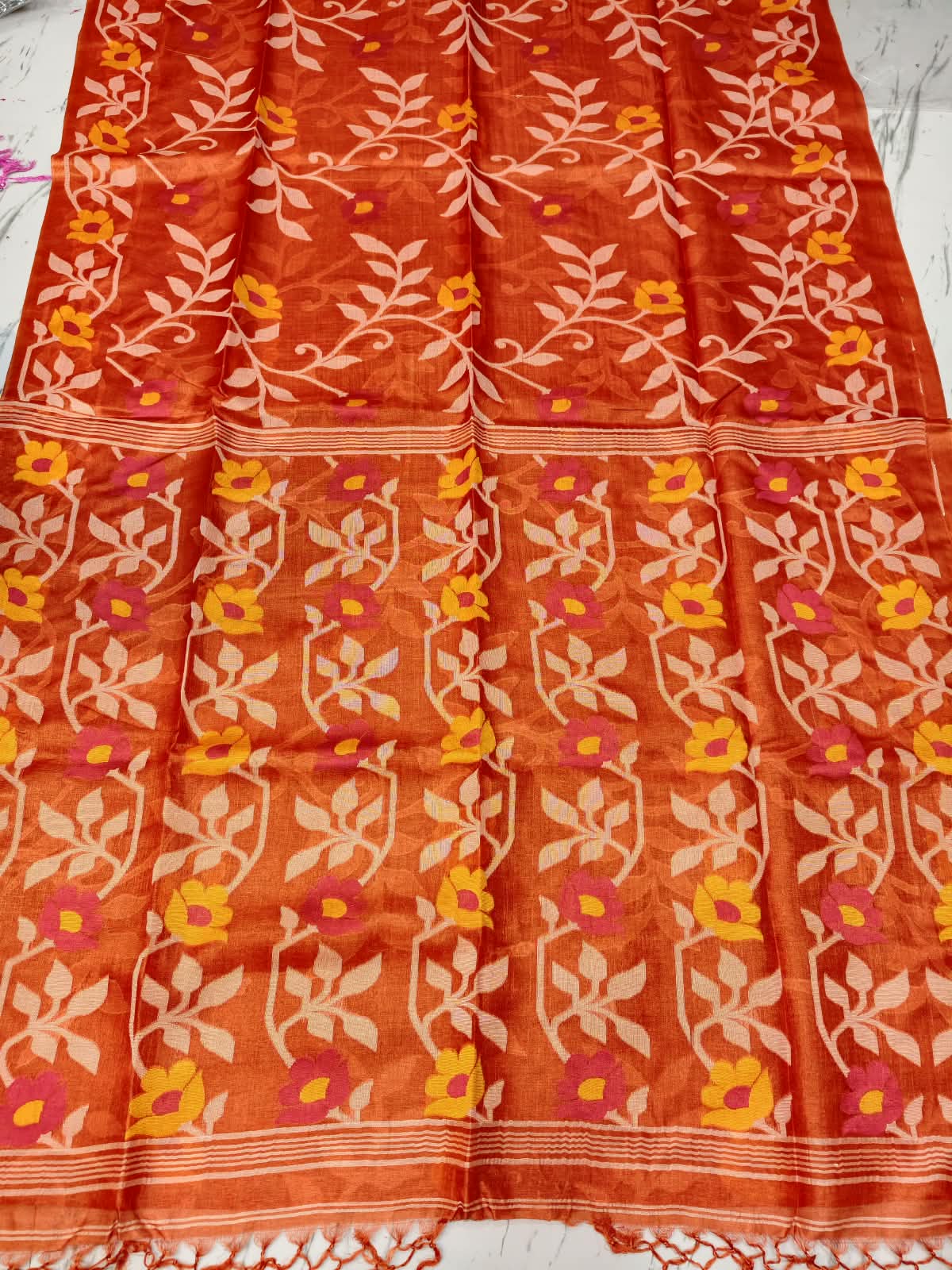 Bageecha Orange Pure Tussar Jamdani saree with intricate all-over handwoven floral Jamdani work, Silk Mark certified by Rihyaaz 
