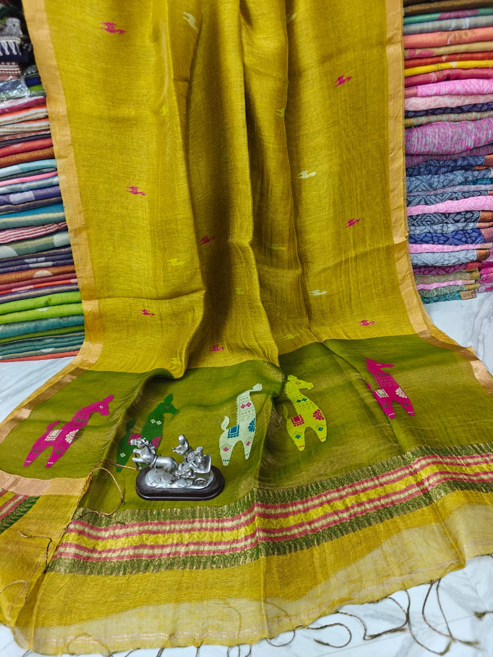 Terracotta Linen Silk Saree with intricate Resham woven palla by Rihyaaz, premium handwoven ethnic saree featuring elegant craftsmanship, soft drape, and timeless festive wear for women