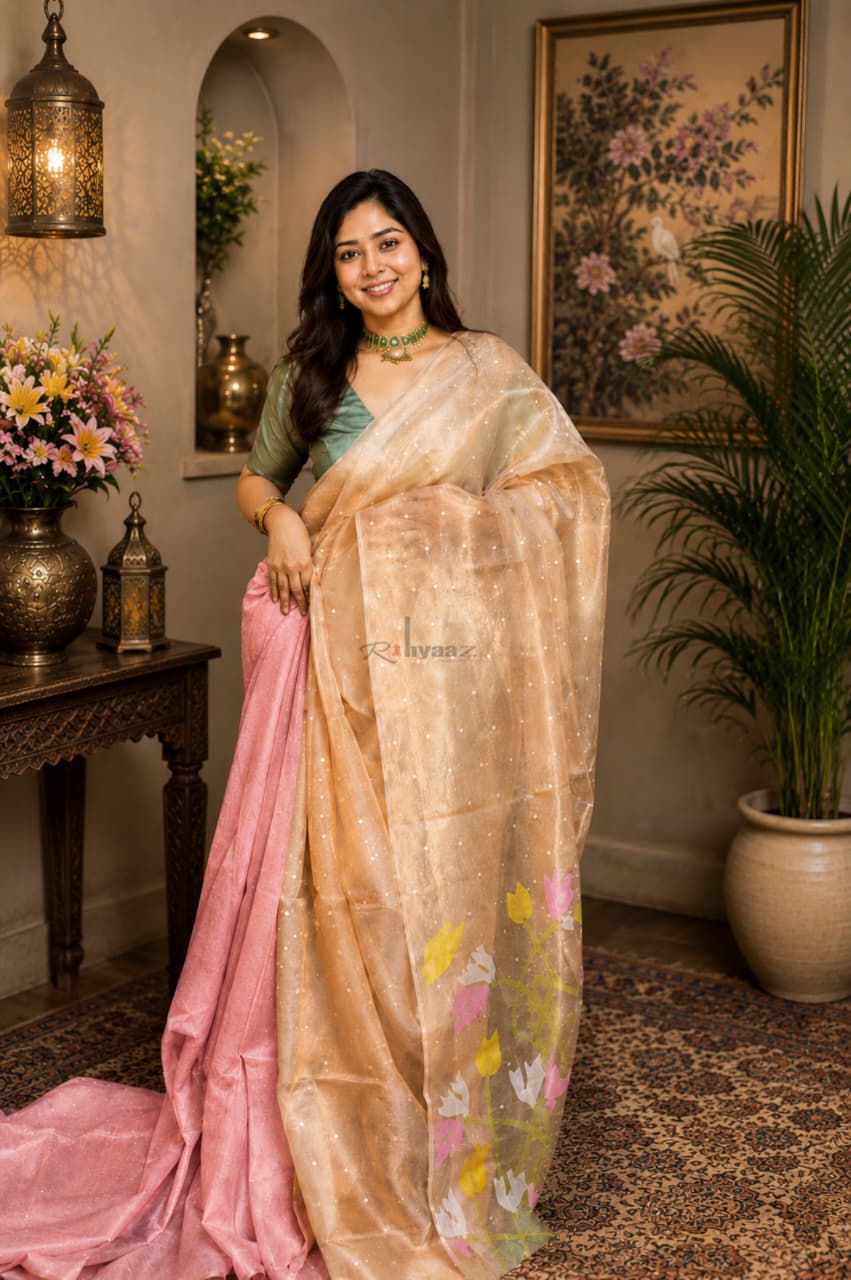 Qala tissue silk sequin weaved saree with intricate Jamdani palla and solid-colour blouse piece, customisable in pastel shades by Rihyaaz.