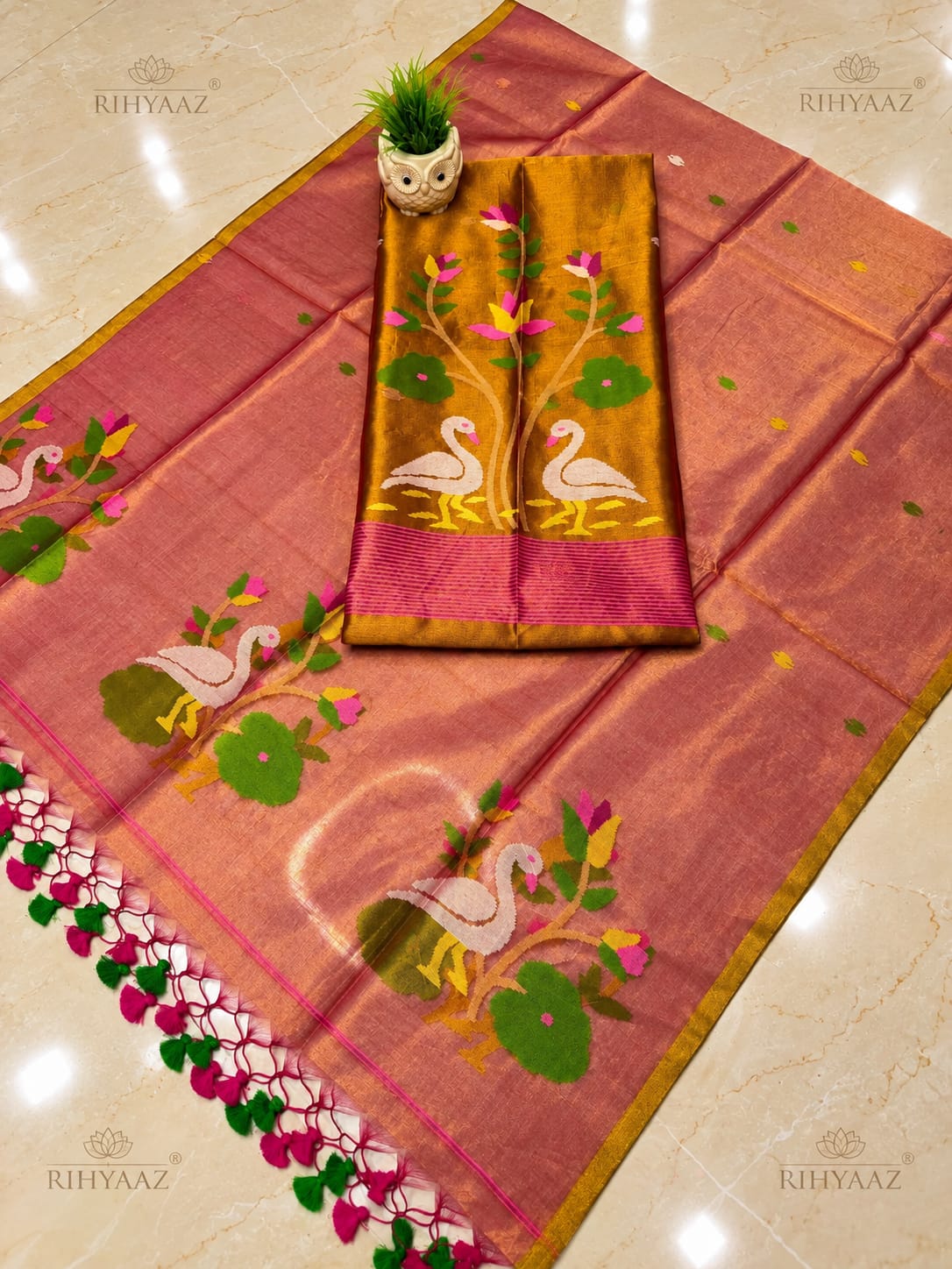Kuhak Peach Tissue Needle Jamdani Suit by Rihyaaz – elegant traditional Indian ethnic wear with intricate Jamdani needle weaving and premium tissue fabric.