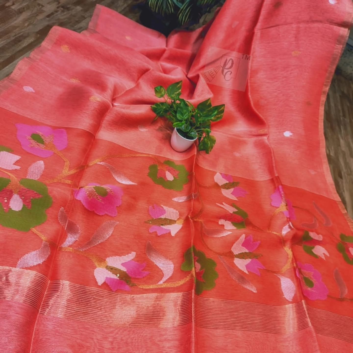 Handwoven Linen by Muslin Floral motifs saree with all-over needle weave work and golden zari border, blouse piece available | Rihyaaz