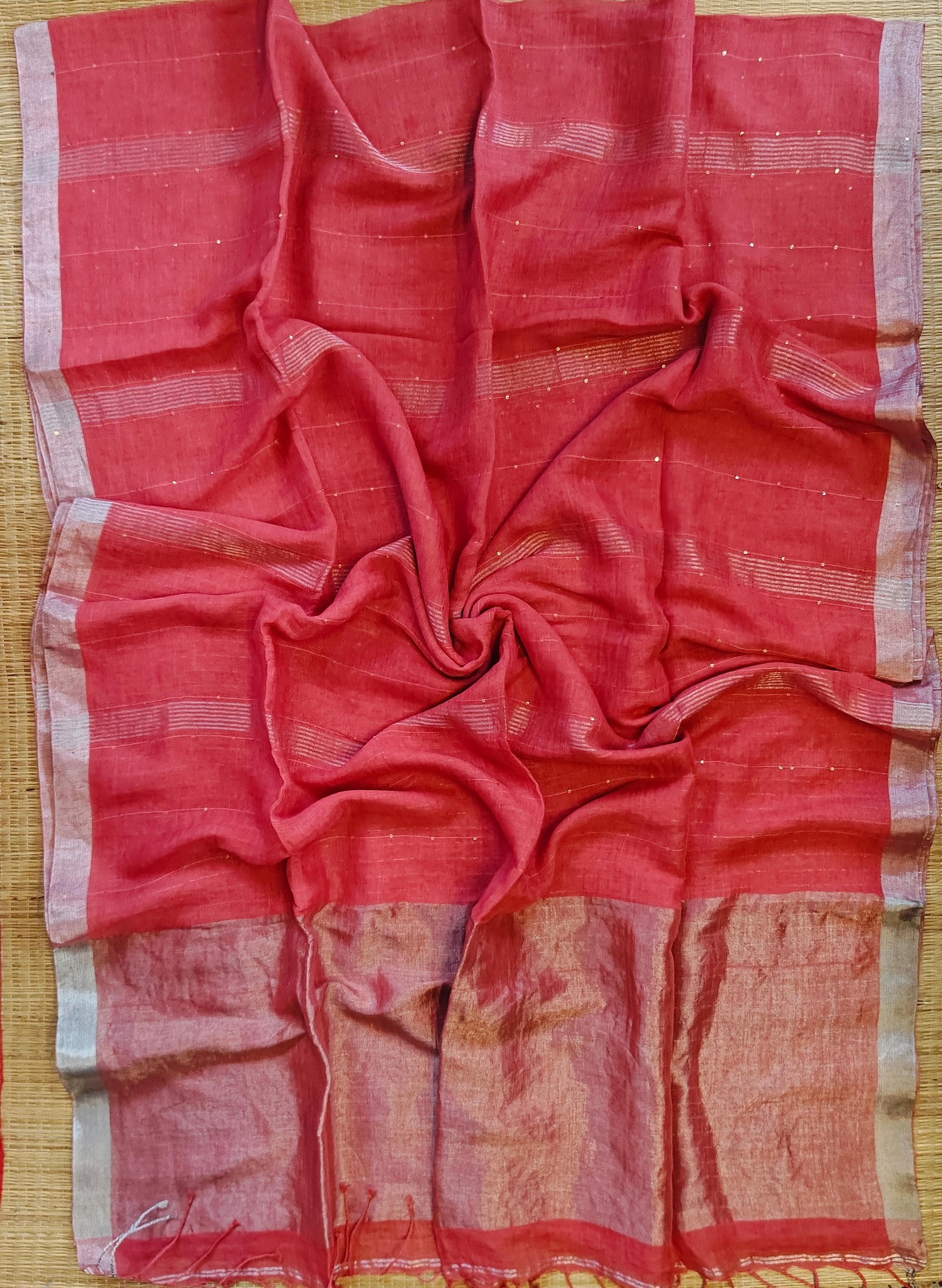 Pehal Premium Jayashree linen saree with tested zari pallu, sleek silver border, all-over sequin-line detailing and zari-striped blouse piece by Rihyaaz.