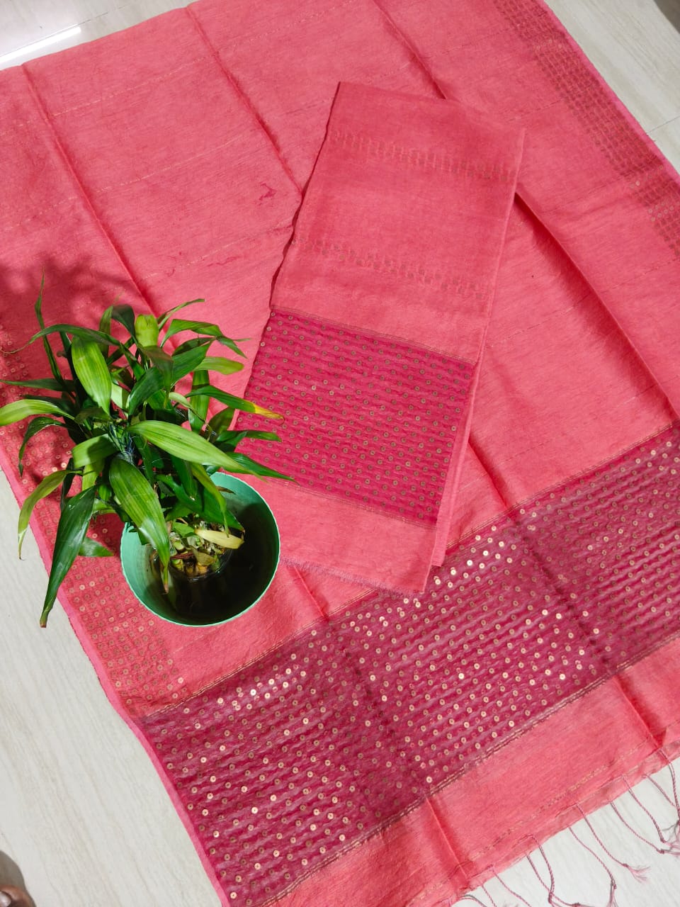 Ira new handwoven Silk Linen Jamdani suit set with 3 meter top and 2.5 meter dupatta featuring elegant net tassel detailing by Rihyaaz.