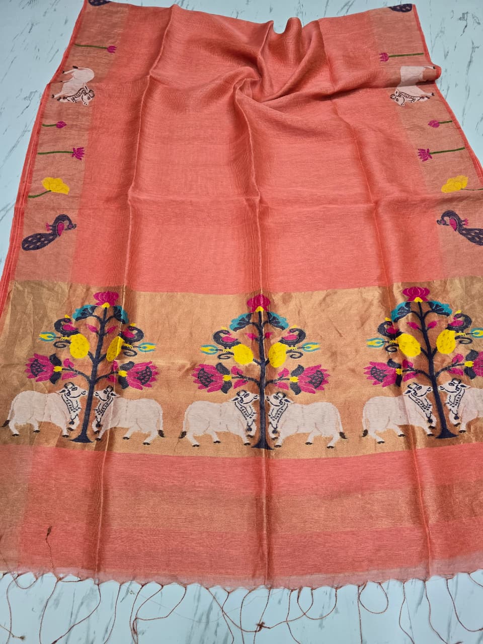 Suravi Silk Linen Pichwai Inspired Jamdani Saree by Rihyaaz featuring intricate handwoven Pichwai-inspired motifs on premium silk linen fabric, ideal for festive, wedding, and ethnic wear.