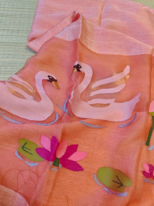 Peach fabric with swan and lily pad pattern