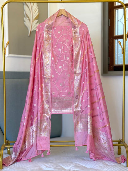 Exclusive Pink Banarasi raw mango silk unstitched salwar kameez with zari-woven top, woven silk dupatta and Silk Katan bottom by Rihyaaz.