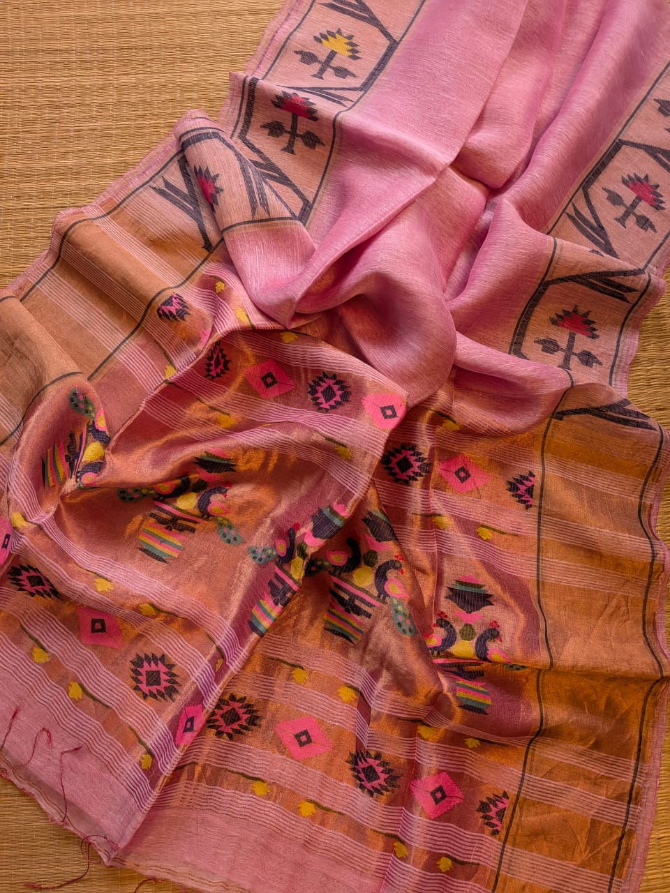 Iravati Pink exclusive silk linen saree featuring a tested zari Jamdani border, elegant Paithani-style tissue pallu, and matching running blouse piece by Rihyaaz Fashions.