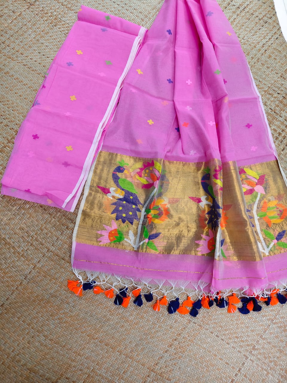 Morni pink premium muslin tissue suit with intricate needle work Jamdani palla Peacock Motif dupatta by Rihyaaz.