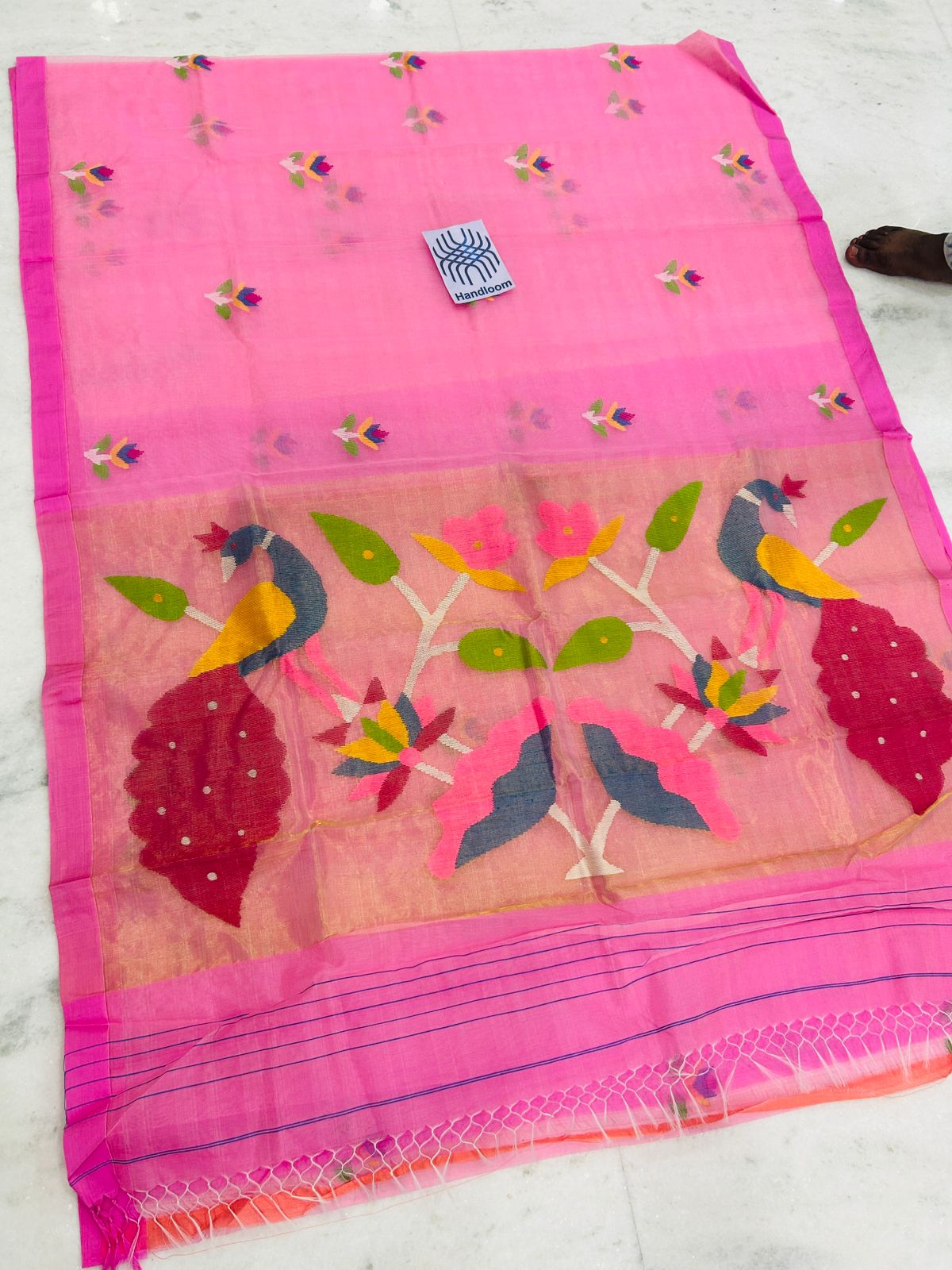 Shahi pure muslin handwoven saree with blouse piece by Rihyaaz, showcasing traditional Indian handloom craftsmanship and elegant woven texture.