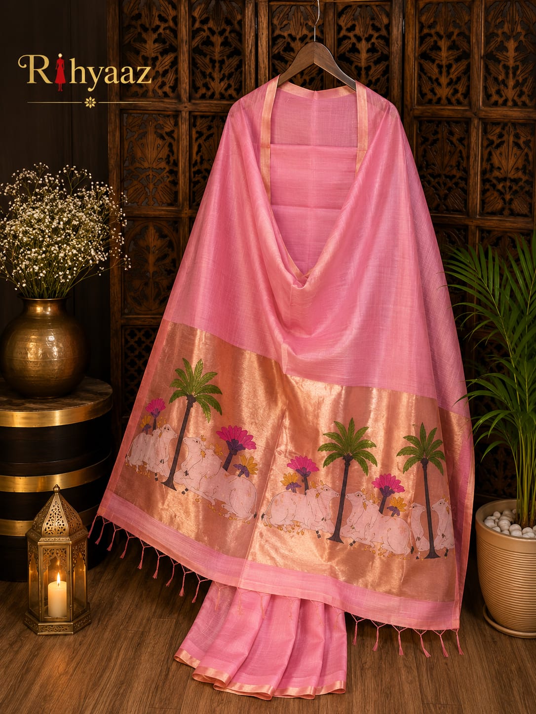 Kamdhenu Silk Linen Pichwai Motif Paithani Jamdani Saree by Rihyaaz featuring intricate Pichwai-inspired weaving, elegant Paithani pallu, handcrafted details, and a plain blouse piece for festive and traditional wear.