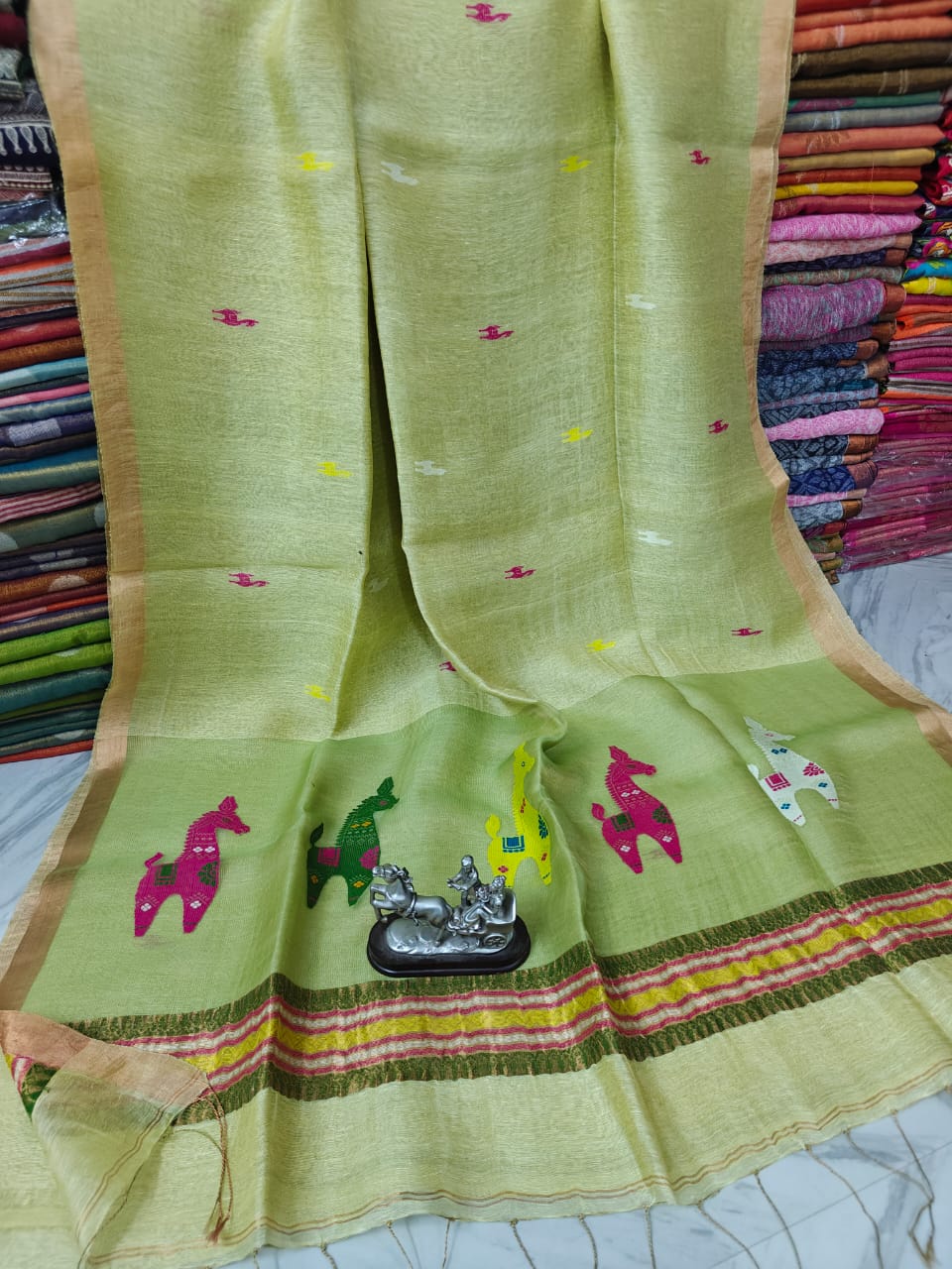 Terracotta Linen Silk Saree with intricate Resham woven palla by Rihyaaz, premium handwoven ethnic saree featuring elegant craftsmanship, soft drape, and timeless festive wear for women