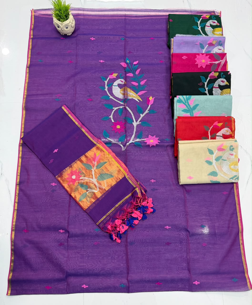 Shop the elegant Muslin Jamdani Top & Dupatta by Rihyaaz. Featuring a 2.6-meter top and 2.5-meter dupatta, this timeless handwoven ensemble celebrates Indian craftsmanship and graceful style.