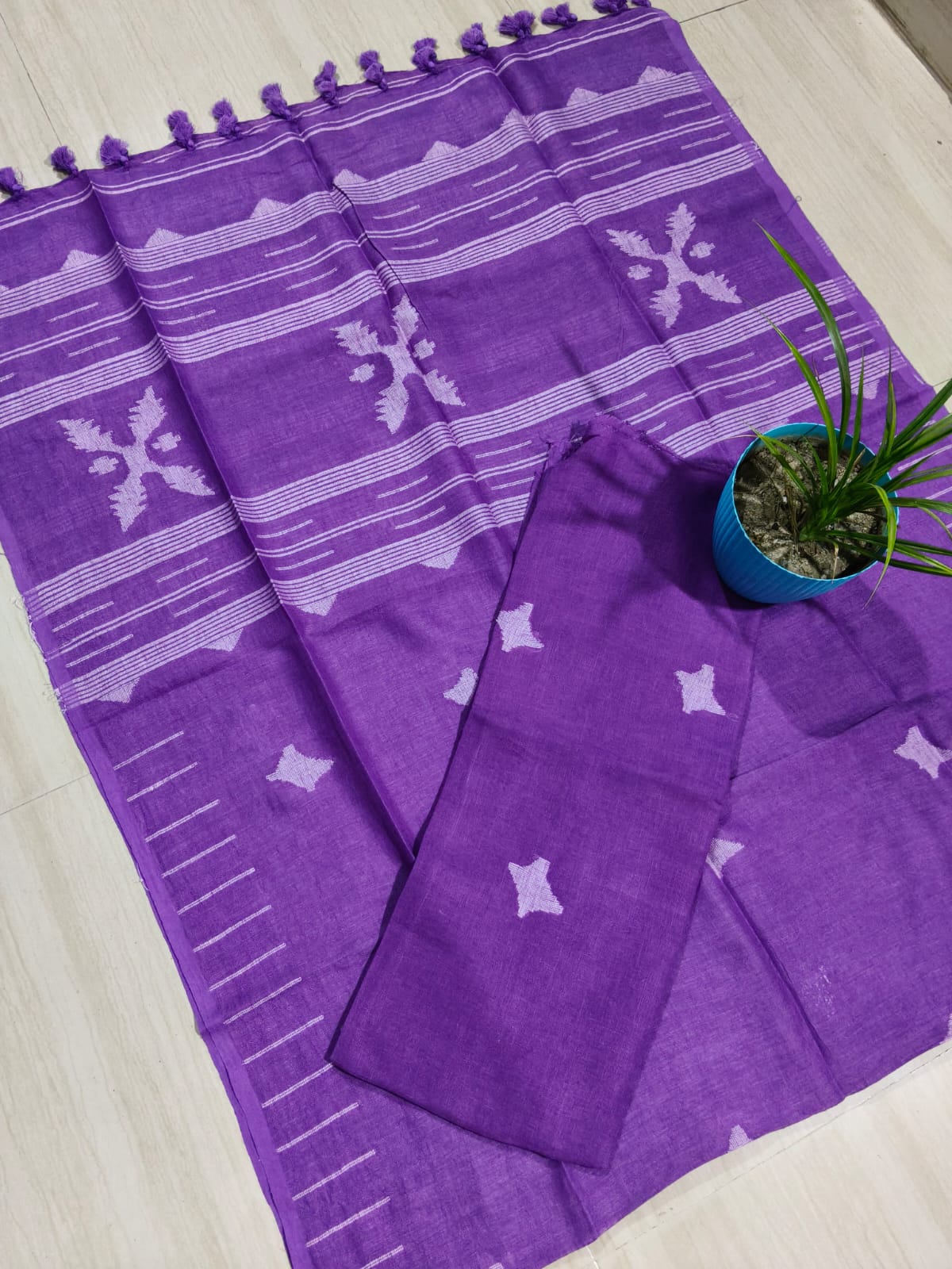 Sparsh linen Jamdani suit with 3-meter top and 2.5-meter tasselled dupatta by Rihyaaz