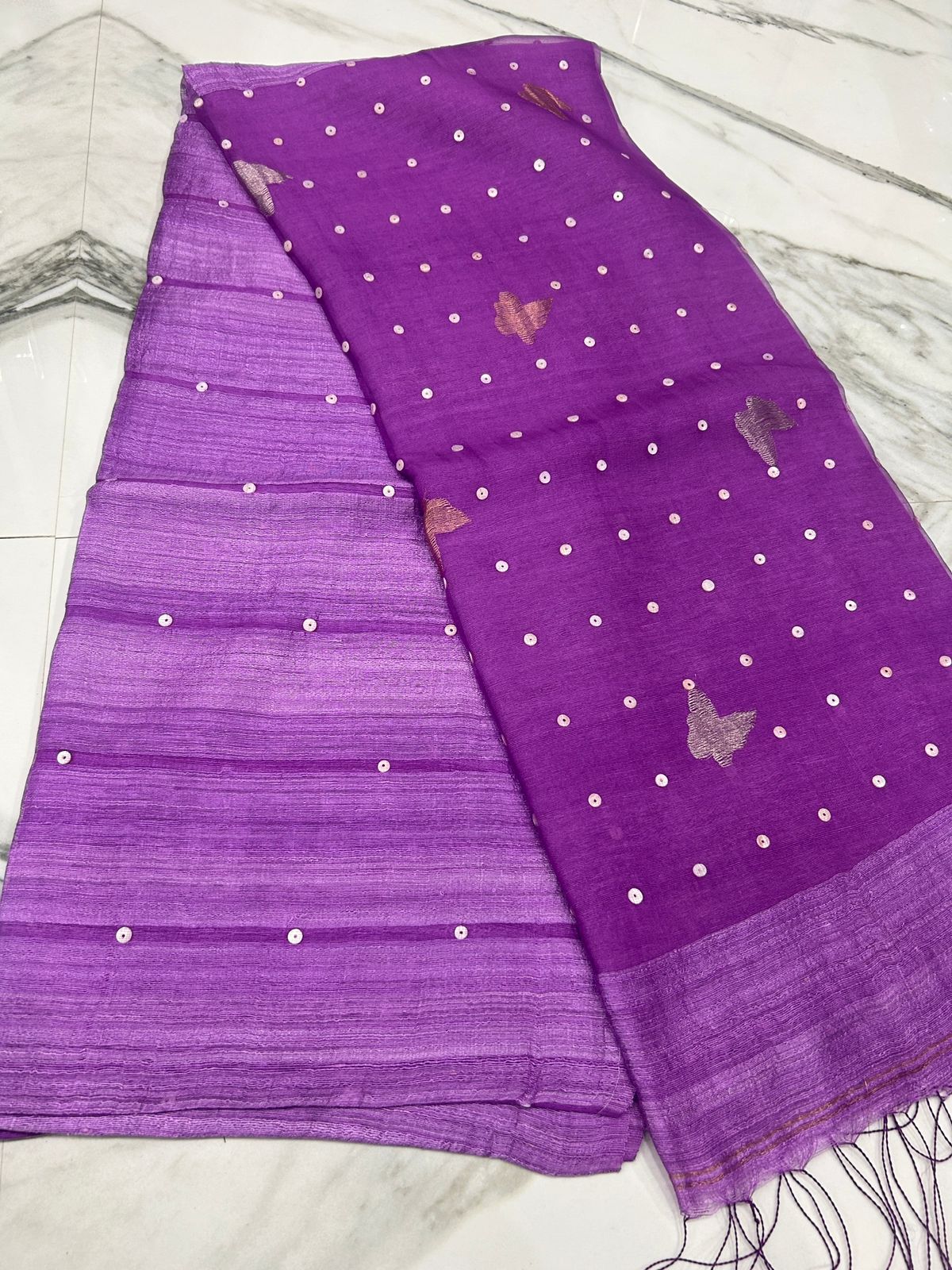 Titli Matka Resham saree with all-over weaved delicate shell sequin detailing and butterfly motifs by Rihyaaz.