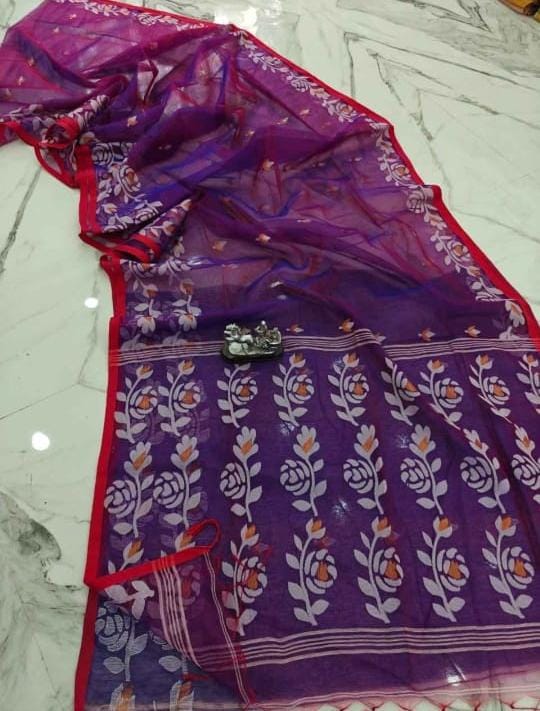 Muslin jacquard weaving saree by Rihyaaz featuring intricate woven patterns and an elegant lightweight drape.