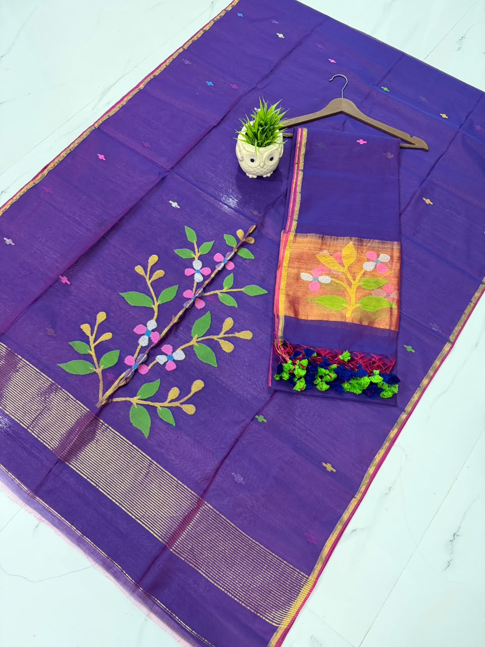 Muslin Jamdani handwoven suit set with 2.5-meter top and 2.5-meter dupatta featuring elegant tassels by Rihyaaz.