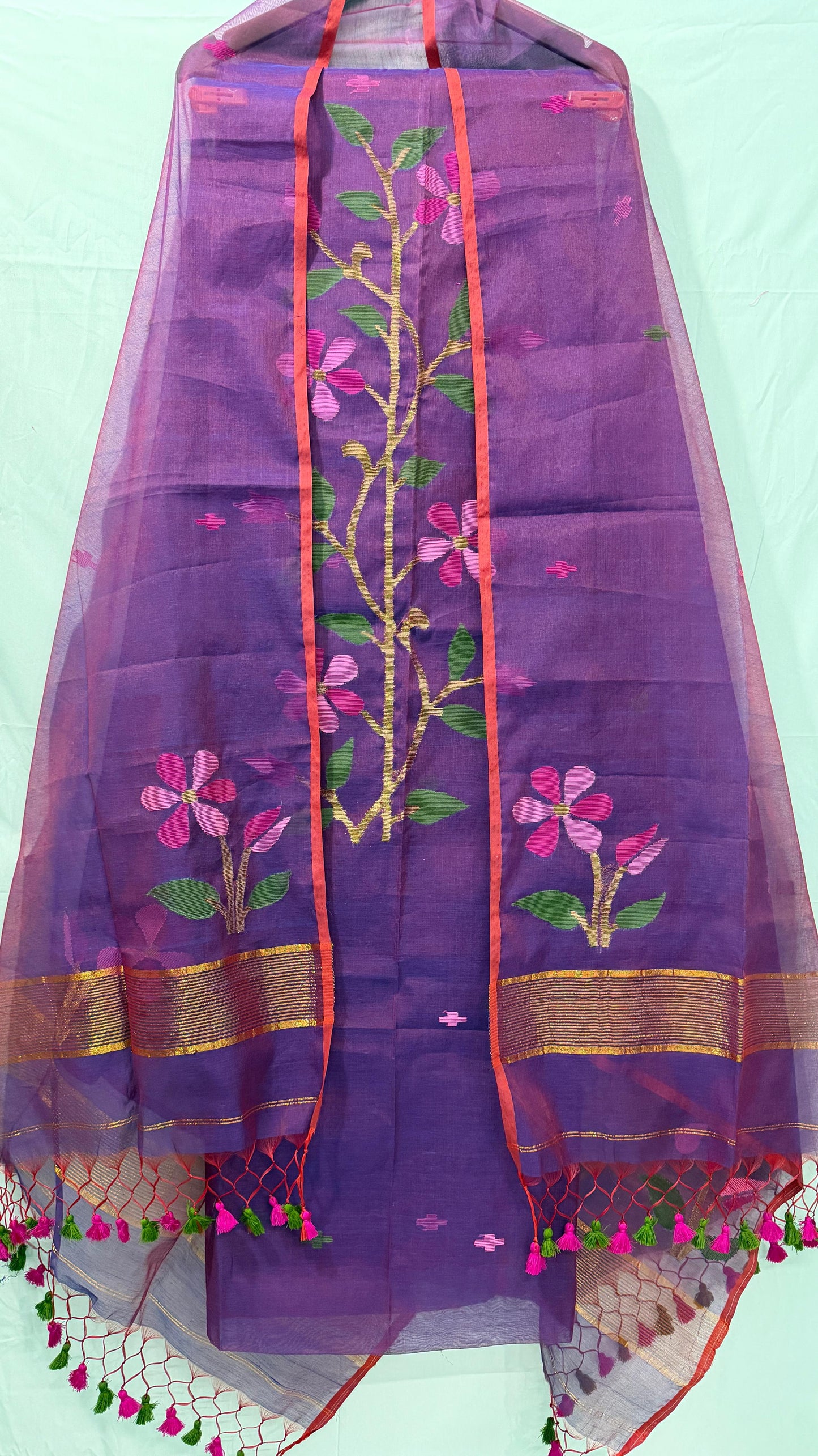 Rihyaaz Muslin Jamdani suit with handwoven detailing, 2.5 meter top and 2.5 meter tassel-finished dupatta.