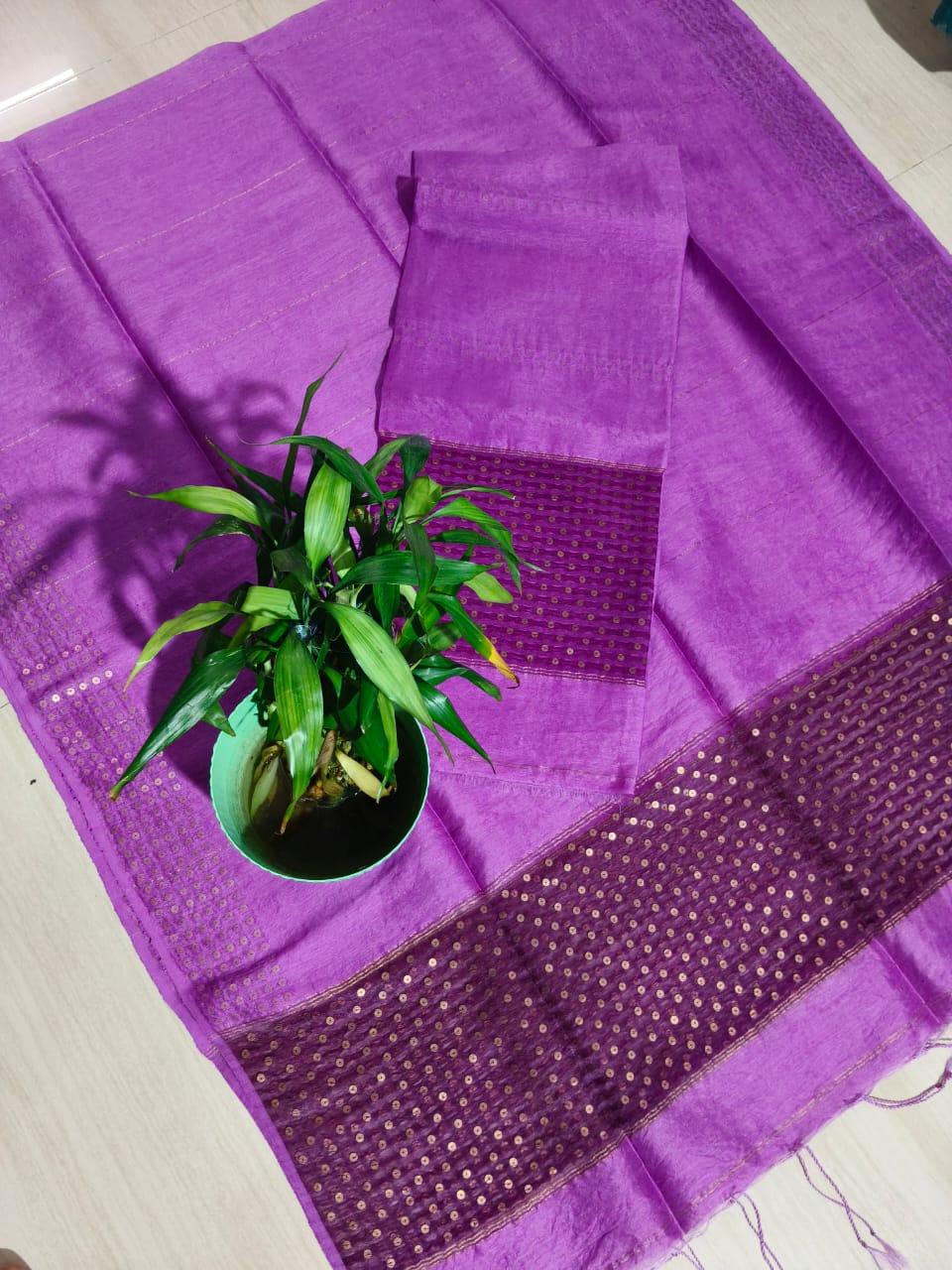 Ira new handwoven Silk Linen Jamdani suit set with 3 meter top and 2.5 meter dupatta featuring elegant net tassel detailing by Rihyaaz.