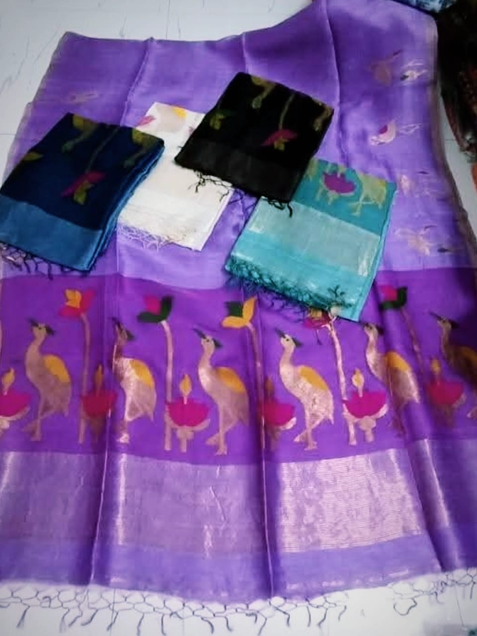 Pelican - Silk Linen Tissue Saree by Rihyaaz featuring premium handwoven silk linen tissue fabric with an elegant sheen, lightweight drape, and luxurious festive design for weddings and celebrations.