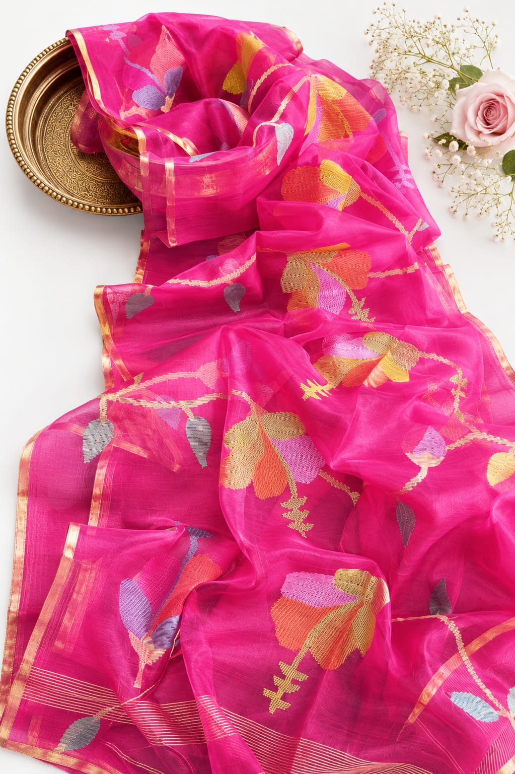 Blossom muslin Jamdani saree with allover floral handwoven motifs by Rihyaaz
