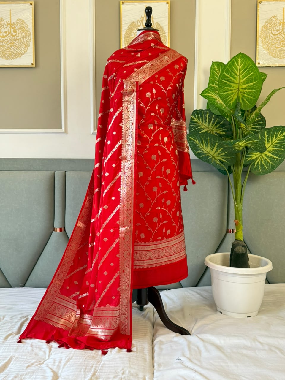 Exclusive Red Banarasi raw mango silk unstitched salwar kameez with zari-woven top, woven silk dupatta and Silk Katan bottom by Rihyaaz.