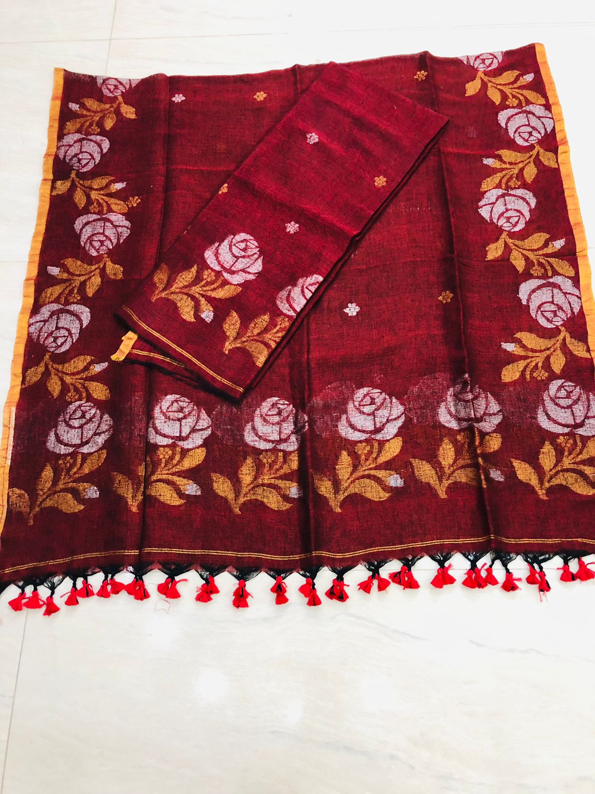 Rose handwoven Jamdani weave suit by Rihyaaz Fashions, showcasing traditional Indian handloom craftsmanship and elegant ethnic design.